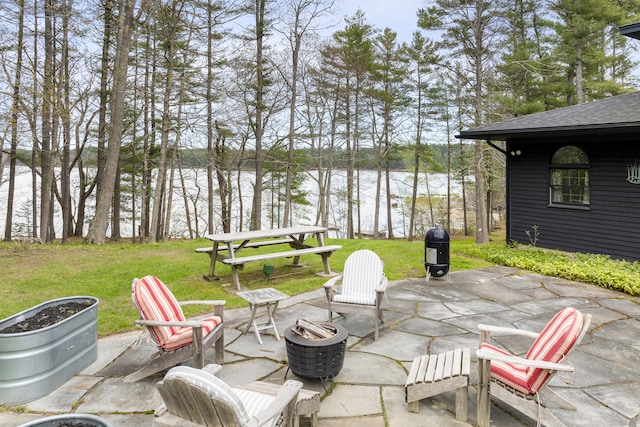 view of patio / terrace featuring a water view