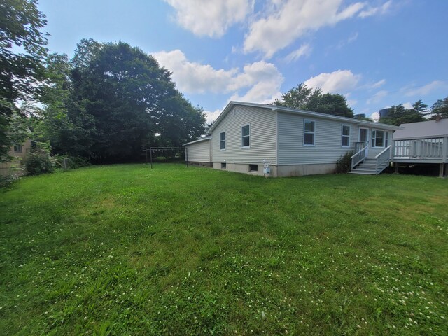 110 Lincoln St, Old Town, ME 04468 - rear view of property with a deck and a yard