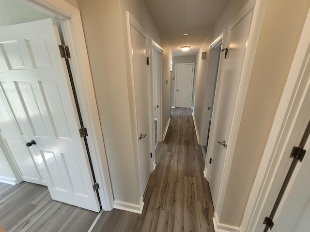 110 Lincoln St, Old Town, ME 04468 - hall featuring dark wood-style flooring and baseboards