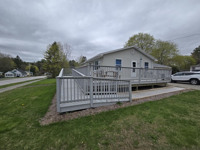 110 Lincoln St, Old Town, ME 04468 - rear view of property with a yard and a wooden deck