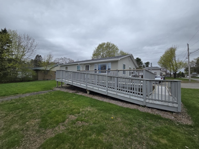 110 Lincoln St, Old Town, ME 04468 - rear view of house featuring a deck and a lawn