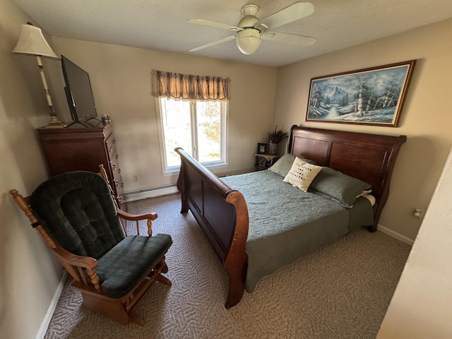 43 Webb River Dr, Dixfield, ME 04224 - carpeted bedroom featuring baseboard heating, baseboards, and a ceiling fan