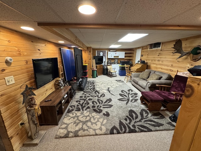 43 Webb River Dr, Dixfield, ME 04224 - carpeted living area with wood walls and a drop ceiling