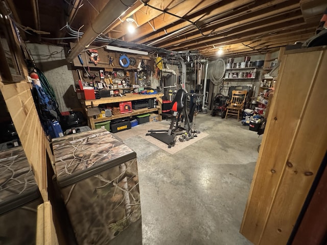 43 Webb River Dr, Dixfield, ME 04224 - unfinished below grade area featuring a workshop area