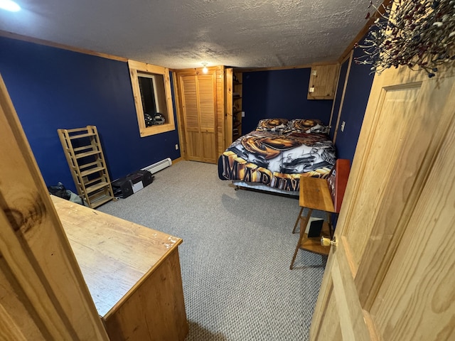 43 Webb River Dr, Dixfield, ME 04224 - bedroom featuring baseboard heating, carpet flooring, and a textured ceiling