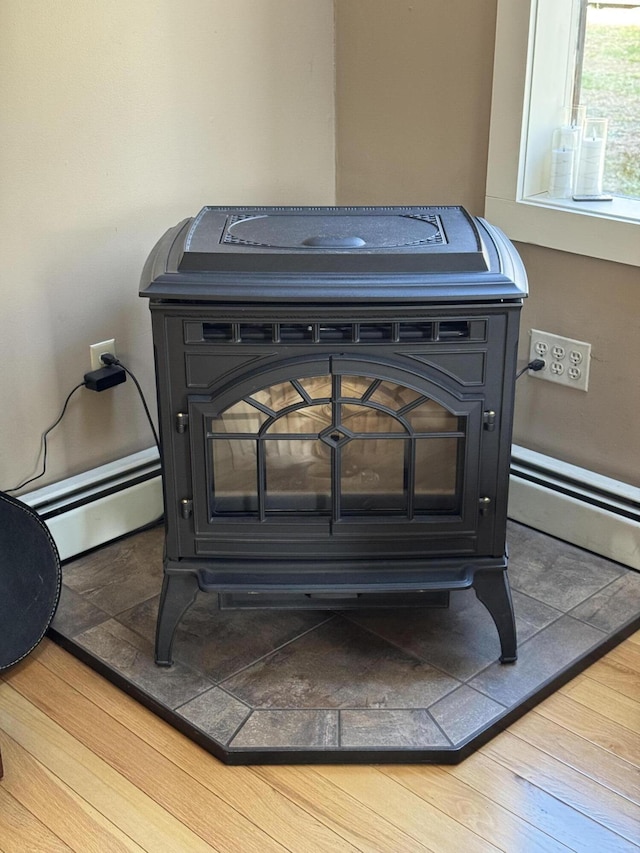 43 Webb River Dr, Dixfield, ME 04224 - detailed view of baseboard heating and wood finished floors