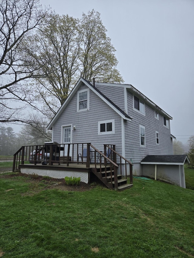 598 Washington Rd, Waldoboro, ME 04572 - rear view of property with a wooden deck and a yard