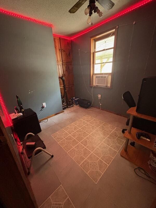 623 Gore Rd, Otisfield, ME 04270 - interior space featuring a ceiling fan, a textured ceiling, and cooling unit