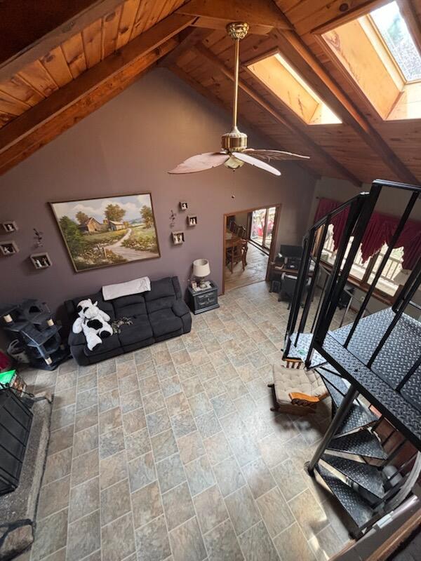 623 Gore Rd, Otisfield, ME 04270 - living room with a skylight, wood ceiling, and ceiling fan