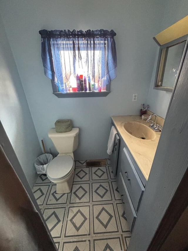 623 Gore Rd, Otisfield, ME 04270 - bathroom featuring vanity, tile patterned floors, and toilet
