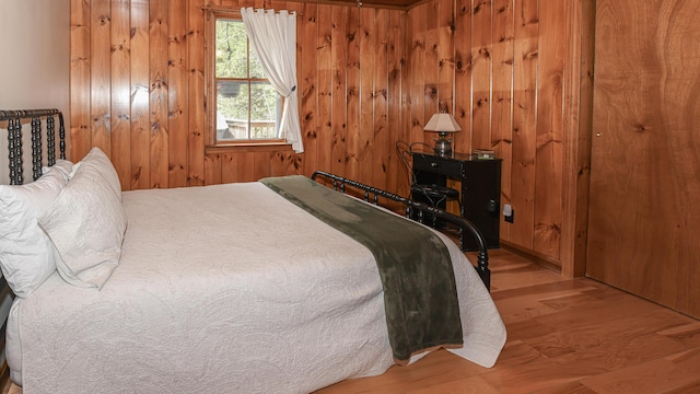 124 Alpine Village Rd, Harrison, ME 04040 - bedroom with wood finished floors and wooden walls