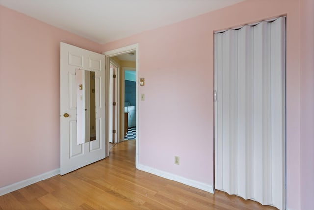 30 Glenridge Dr Unit 30, Portland, ME 04102 - unfurnished bedroom with light wood-style flooring and baseboards