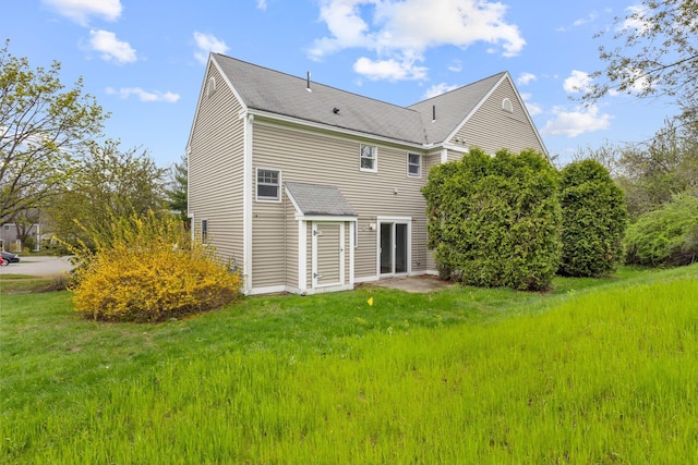 30 Glenridge Dr Unit 30, Portland, ME 04102 - rear view of property with roof with shingles and a lawn