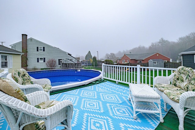 view of pool featuring a residential view
