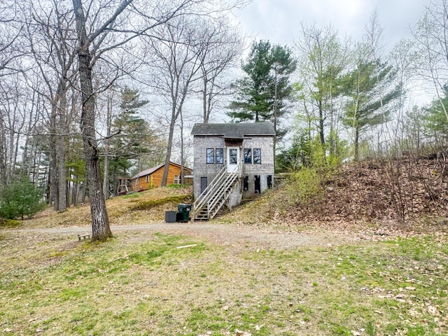 113 Sandy Beach Rd, Glenburn, ME 04401 - view of front of property featuring stairs