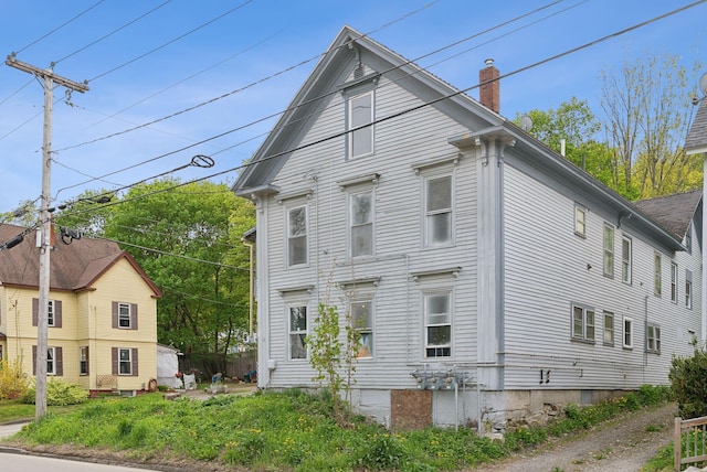 14 N St, Augusta, ME 04330 - view of side of property featuring a chimney