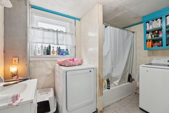14 N St, Augusta, ME 04330 - full bathroom featuring washer / clothes dryer, tile walls, a textured ceiling, tile patterned flooring, and vanity