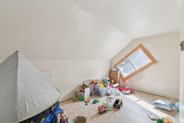 14 N St, Augusta, ME 04330 - playroom featuring vaulted ceiling and baseboards