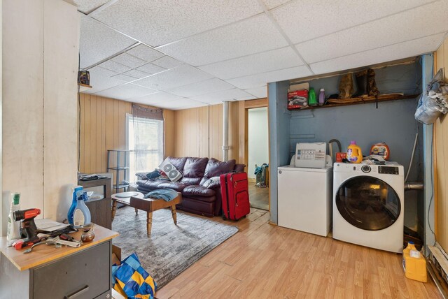 14 N St, Augusta, ME 04330 - clothes washing area featuring washer and dryer, light wood-style floors, and wood walls