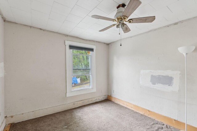 14 N St, Augusta, ME 04330 - carpeted empty room with baseboards and ceiling fan