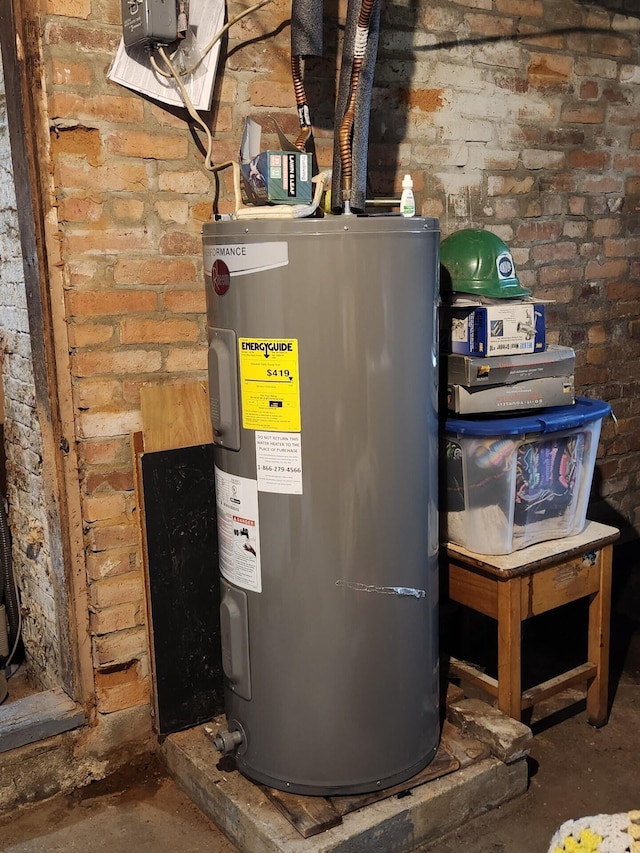 utility room with electric water heater