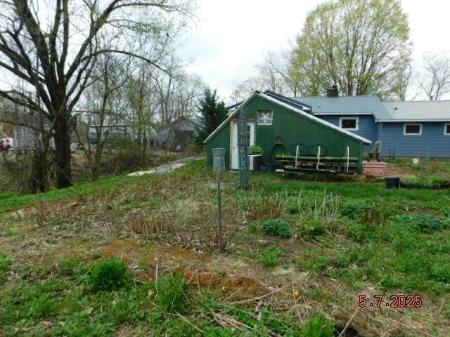 back of property featuring cooling unit