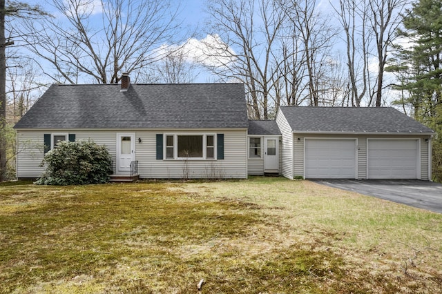 cape cod house featuring driveway, a garage, a shingled roof, entry steps, and a front yard