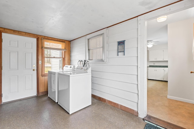 laundry area featuring washer and dryer, baseboards, and a ceiling fan