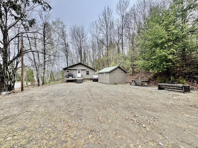 1429 Canada Rd, Moscow, ME 04920 - view of yard featuring a storage shed