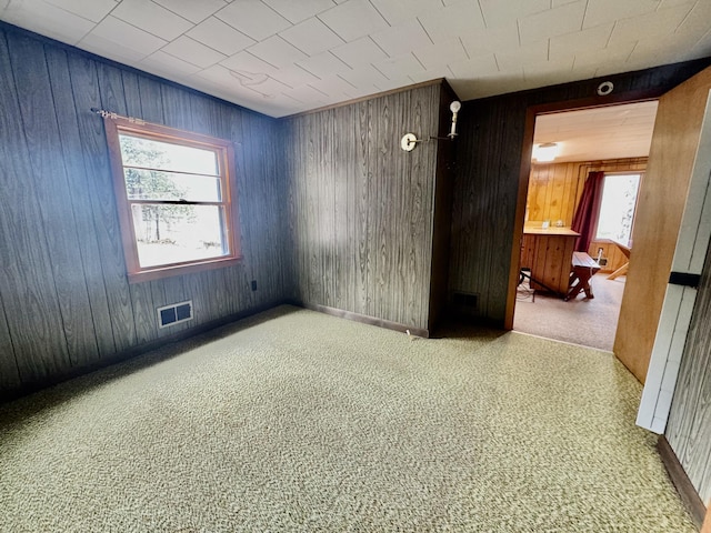 1429 Canada Rd, Moscow, ME 04920 - spare room with wooden walls