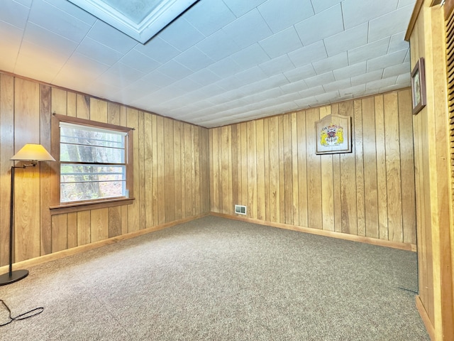 1429 Canada Rd, Moscow, ME 04920 - carpeted spare room with wooden walls