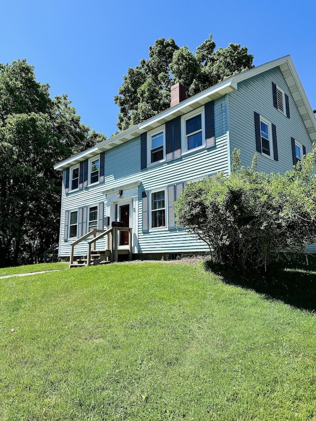 2 High St, Machias, ME 04654 - view of front of house with a chimney and a front yard