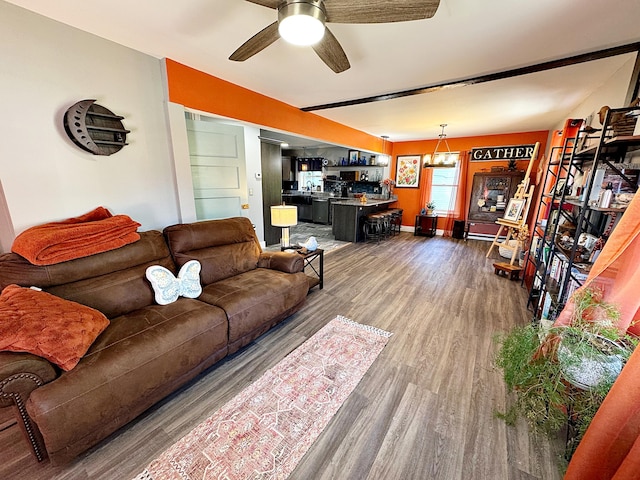 2 High St, Machias, ME 04654 - living area with dark wood finished floors and a ceiling fan