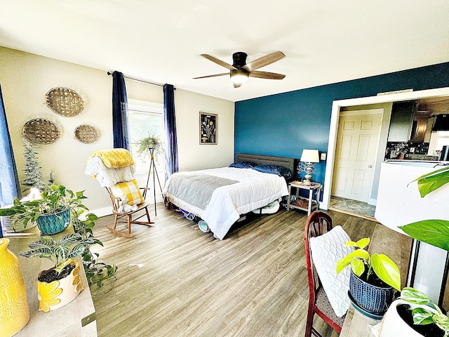 2 High St, Machias, ME 04654 - bedroom with wood finished floors, baseboards, and a ceiling fan