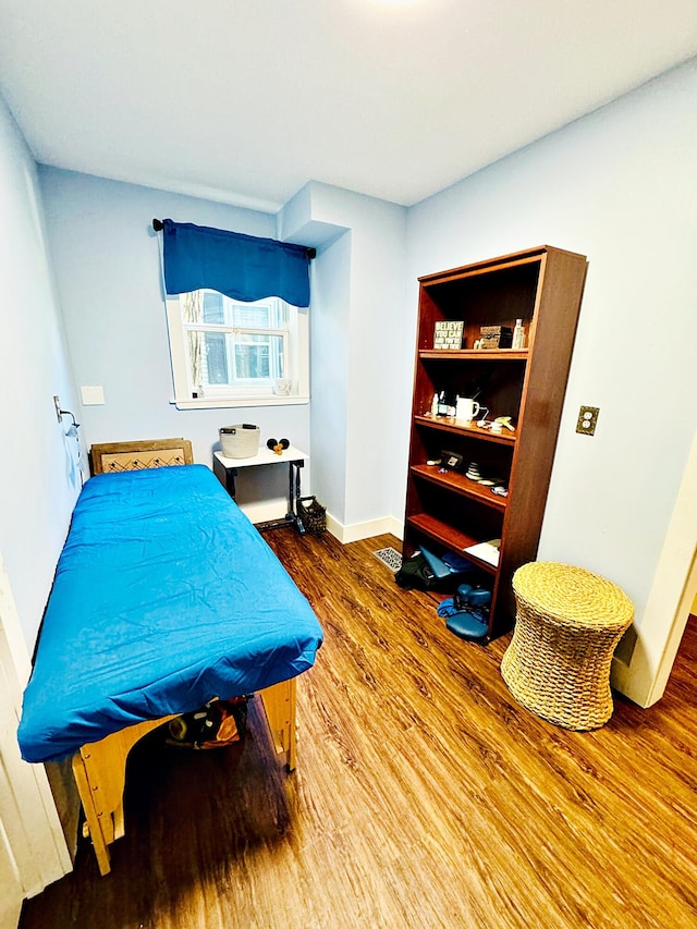 2 High St, Machias, ME 04654 - bedroom with wood finished floors, baseboards, and pool table