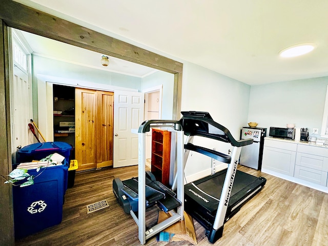 2 High St, Machias, ME 04654 - workout area featuring wood finished floors and ornamental molding