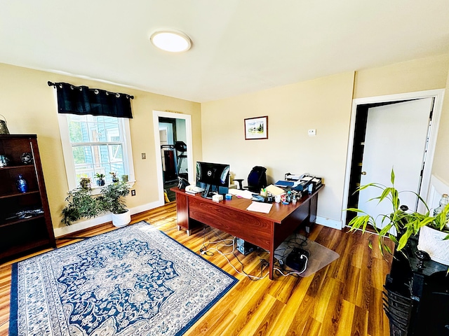 2 High St, Machias, ME 04654 - home office featuring wood finished floors and baseboards