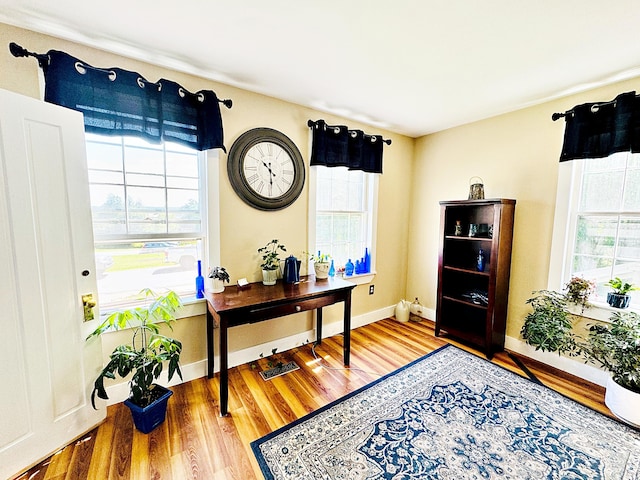 2 High St, Machias, ME 04654 - home office featuring healthy amount of natural light, wood finished floors, and baseboards