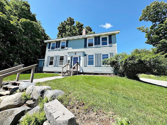 2 High St, Machias, ME 04654 - colonial-style house featuring a chimney and a front yard