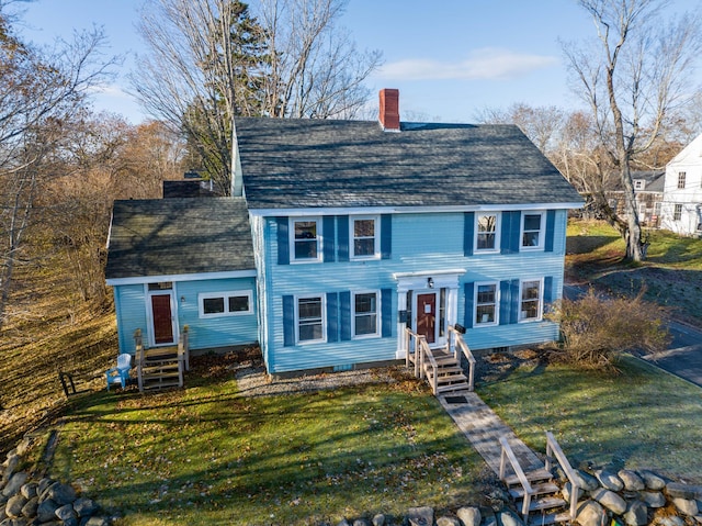 2 High St, Machias, ME 04654 - view of front of property featuring a chimney, a front yard, and a shingled roof