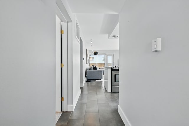 3027 Main St Unit 3027, Carrabassett Valley, ME 04947 - hall featuring baseboards