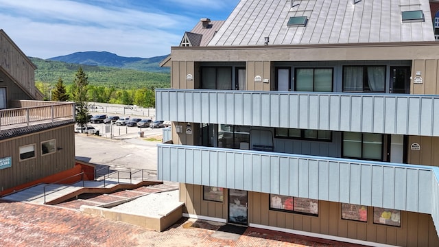 3027 Main St Unit 3027, Carrabassett Valley, ME 04947 - view of building exterior featuring a mountain view