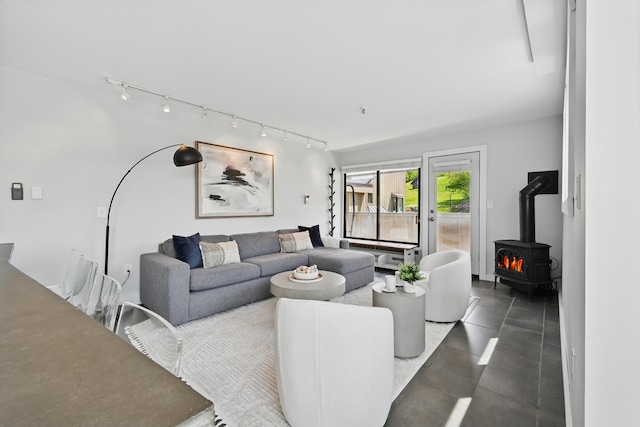 3027 Main St Unit 3027, Carrabassett Valley, ME 04947 - living area featuring rail lighting and a wood stove