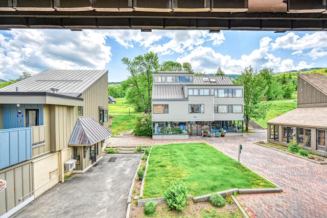 3027 Main St Unit 3027, Carrabassett Valley, ME 04947 - exterior space featuring a lawn