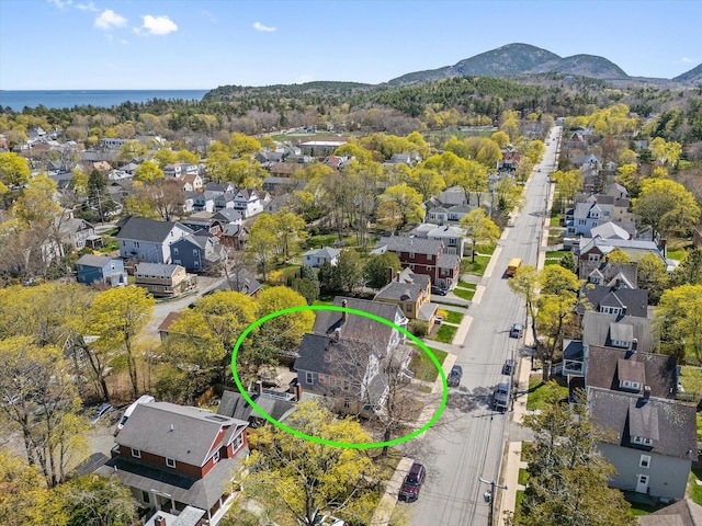 aerial view of residential area with a mountainous background