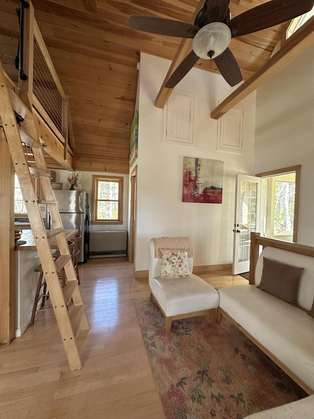 1157 Back Cv, Waldoboro, ME 04572 - living area with wooden ceiling, baseboards, light wood-style flooring, a ceiling fan, and high vaulted ceiling