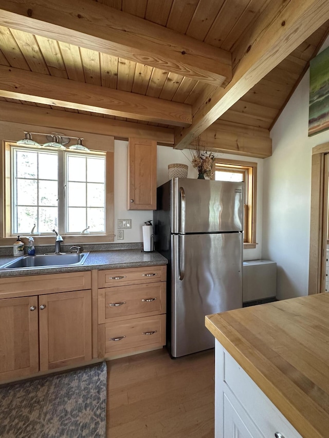 1157 Back Cv, Waldoboro, ME 04572 - kitchen with freestanding refrigerator, a sink, light wood finished floors, wood ceiling, and beamed ceiling