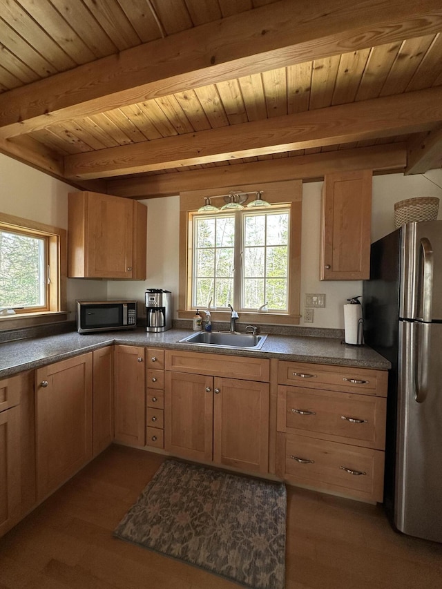 1157 Back Cv, Waldoboro, ME 04572 - kitchen with a sink, appliances with stainless steel finishes, beam ceiling, light wood-style floors, and wood ceiling