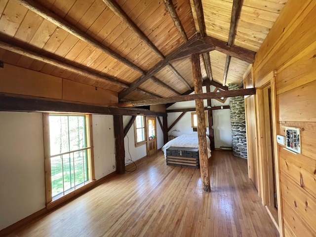 unfurnished bedroom with wooden ceiling and hardwood / wood-style flooring