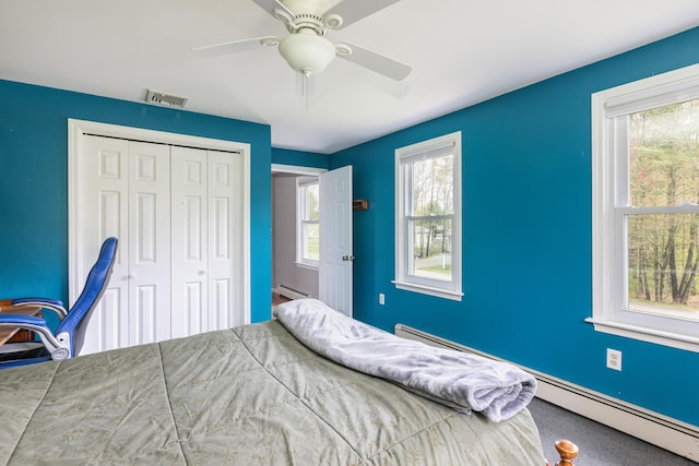 7 Canterbury Pines Dr, Gorham, ME 04038 - bedroom featuring baseboard heating, a closet, and ceiling fan